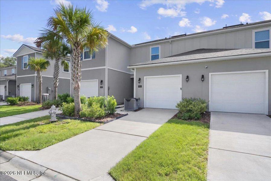 Front exterior of a new home in , Middleburg, FL, highlighting curb appeal (Image 2). Front exterior of a new home in , Middleburg, FL, highlighting curb appeal (Image 2).
