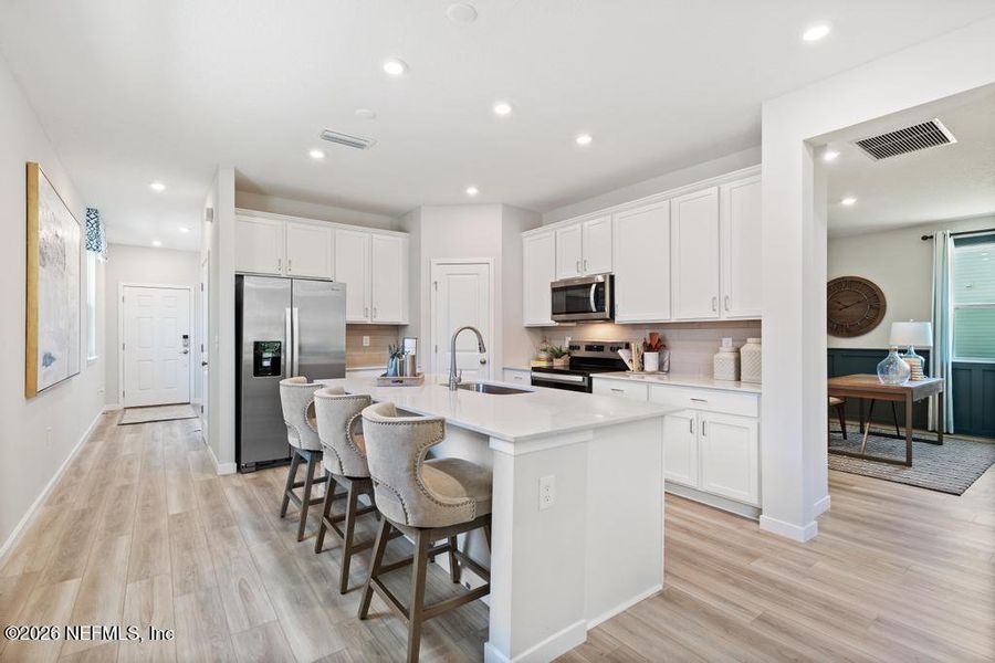 Furnished interior view inside a new home in Seminole Palms, Palm Coast (Image 9). Furnished interior view inside a new home in Seminole Palms, Palm Coast (Image 9).