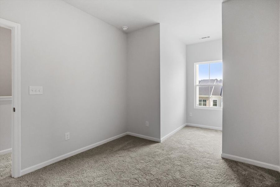 Spacious, unfurnished interior of a new home in Renaissance at White Oak, Garner (Image 19).
