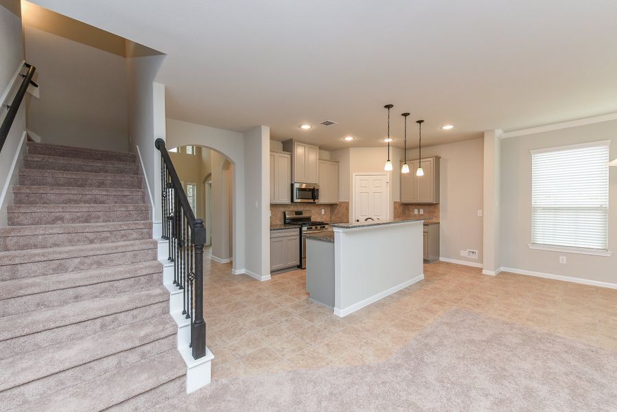 Representative furnished interior of a home built from the Floor Plan 2201 by Colina Homes in Grand Magnolia, Magnolia (Image 12).
