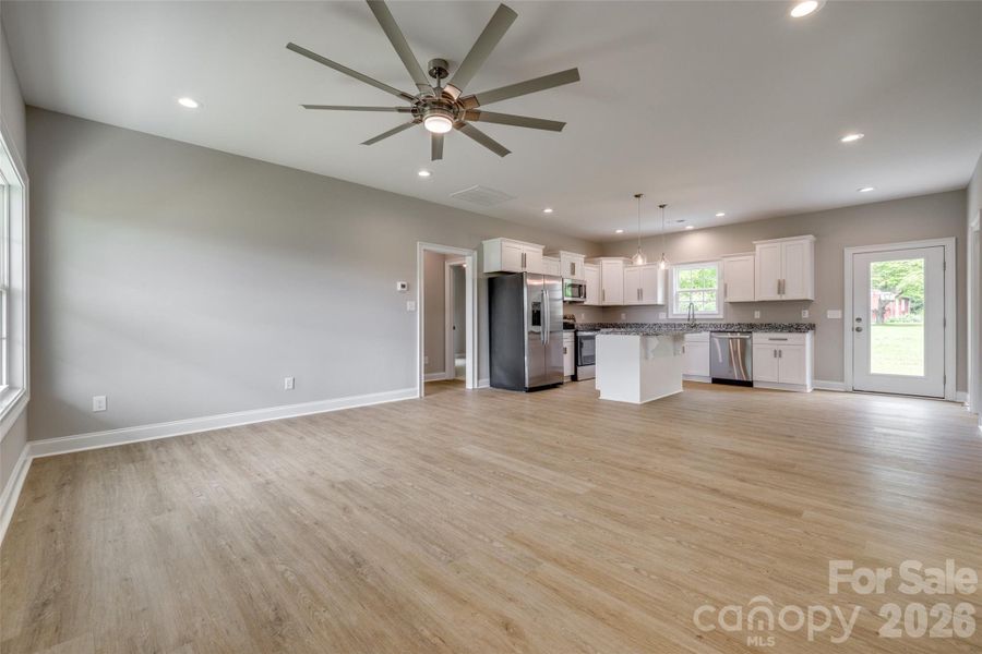 Representative photo of same build. Layout reversed per attached floorplan. Colors and selections may differ.