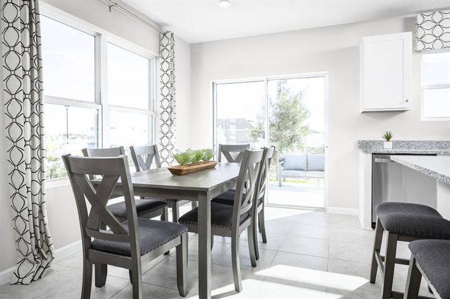 Representative furnished interior of a home built from the Piper End Home by Ryan Homes in Waverly at Wylder, Port St. Lucie (Image 7).