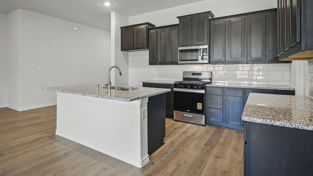 Representative furnished interior of a home built from the Harbour by D.R. Horton in The Woods at Lindsey Place, Anna (Image 3).