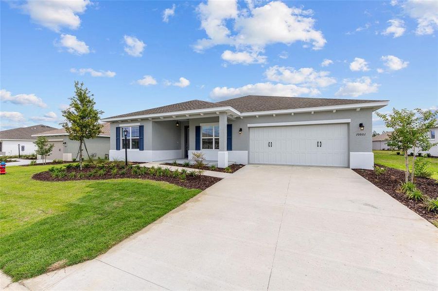 Front exterior of a new home in , Ocala, FL, highlighting curb appeal (Image 18).