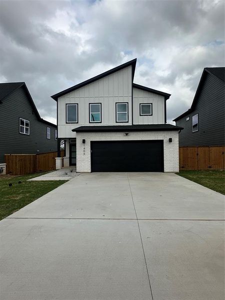 Front exterior of a new home in , Dallas, TX, highlighting curb appeal (Image 15).