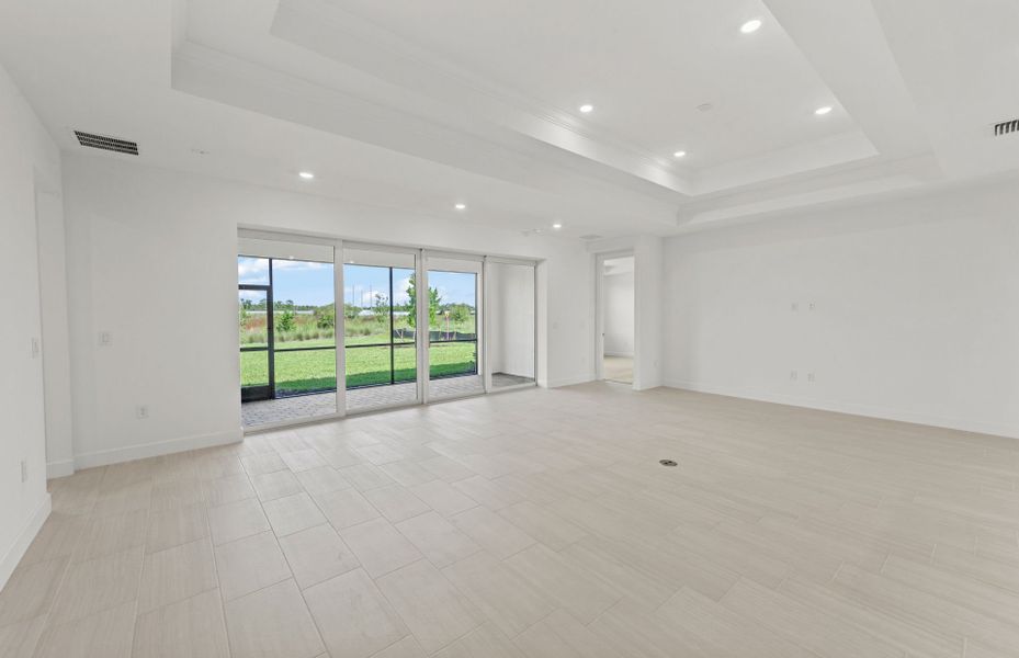 Spacious, unfurnished interior of a new home in Del Webb Oak Creek, North Fort Myers (Image 12).