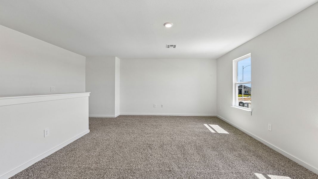 Spacious, unfurnished interior of a new home in Monarch Ranch, Manor (Image 35).