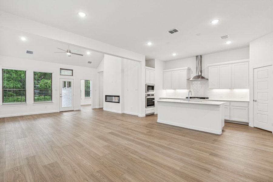 Open First Floor in the Picasso II home plan by Trophy Signature Homes – REPRESENTATIVE PHOTO Open First Floor in the Picasso II home plan by Trophy Signature Homes – REPRESENTATIVE PHOTO