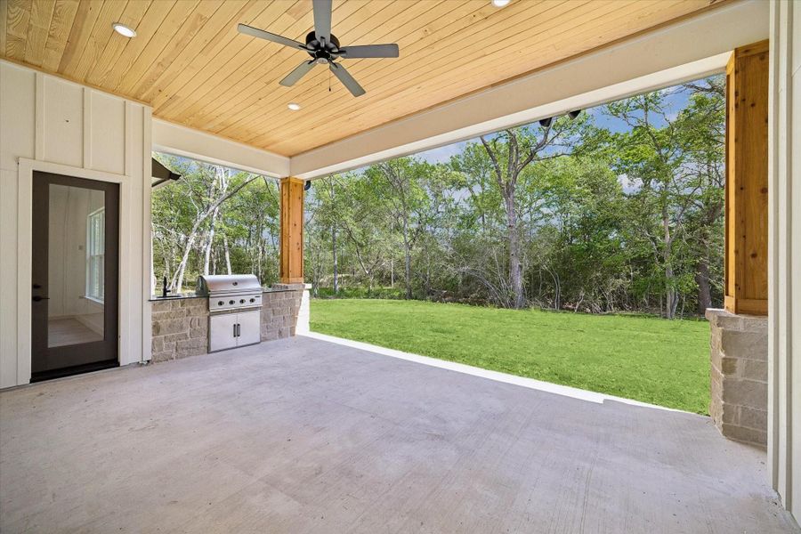 Exterior details and patio area of a home in , Plantersville (Image 3).