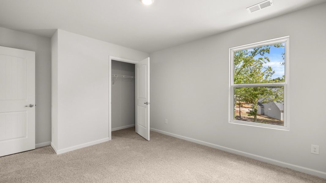 Representative unfurnished interior of a home built from the Elle by D.R. Horton in Fairway 17 at Mirror Lake, Villa Rica (Image 52). Representative unfurnished interior of a home built from the Elle by D.R. Horton in Fairway 17 at Mirror Lake, Villa Rica (Image 52).