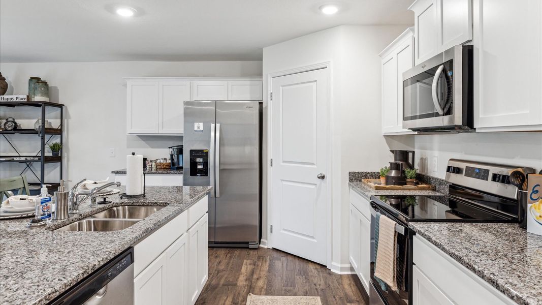Representative furnished interior of a home built from the Cali by D.R. Horton in Fox Hollow, Dalton (Image 17). Representative furnished interior of a home built from the Cali by D.R. Horton in Fox Hollow, Dalton (Image 17).