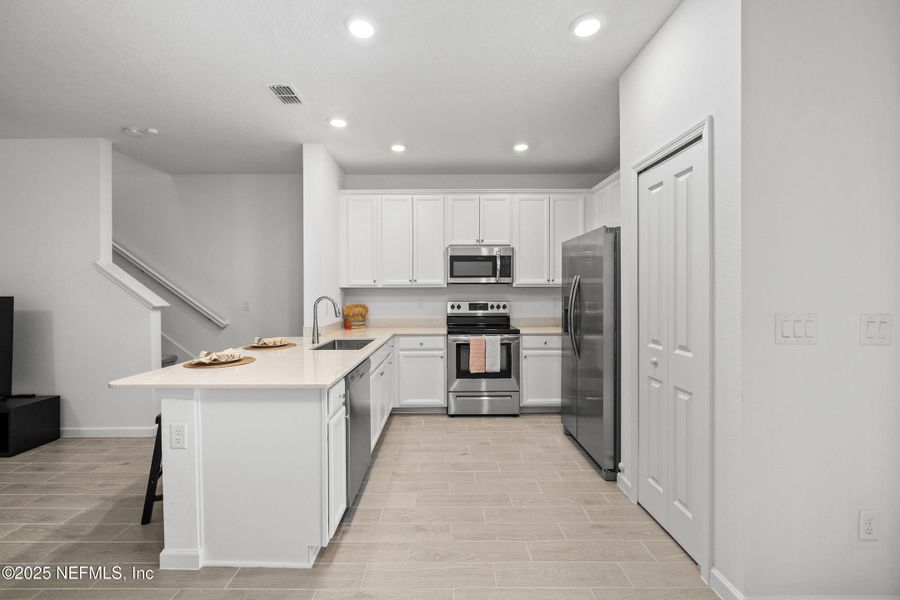 Furnished interior view inside a new home in , St. Augustine (Image 38).