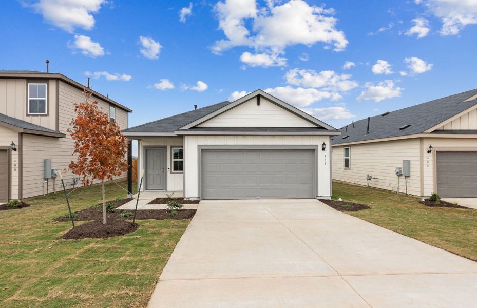 Front exterior of a new home in Larson Crossing, Elgin, TX, highlighting curb appeal (Image 17).