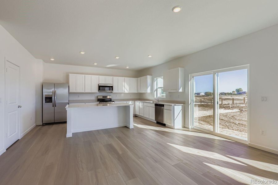 Spacious, unfurnished interior of a new home in Eastcreek Farm: The Camden Collection, Thornton (Image 7).