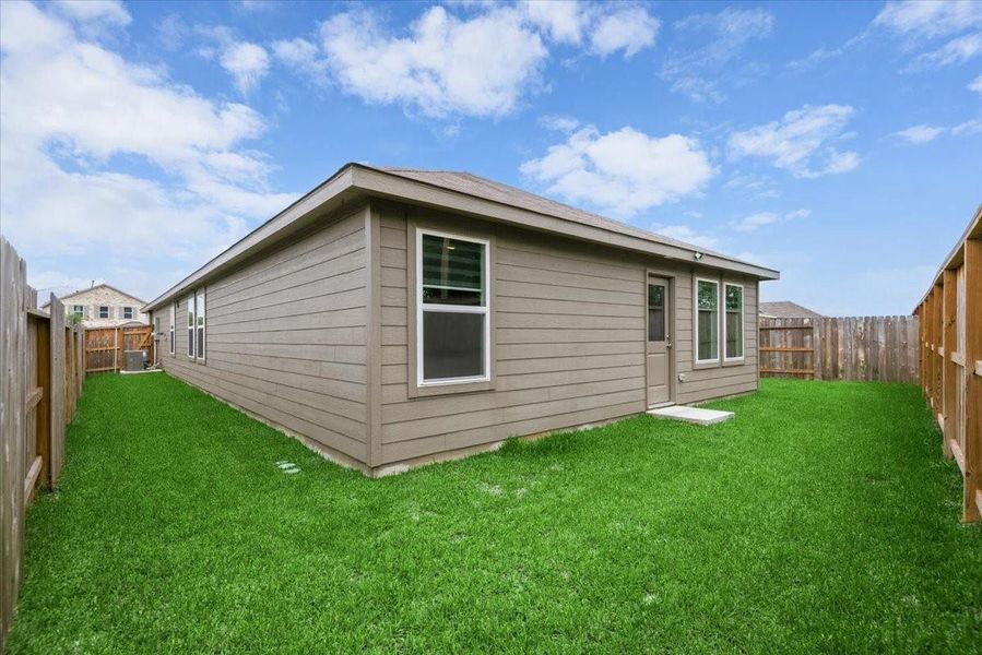 Exterior details and patio area of a home in Tavola, New Caney (Image 22).