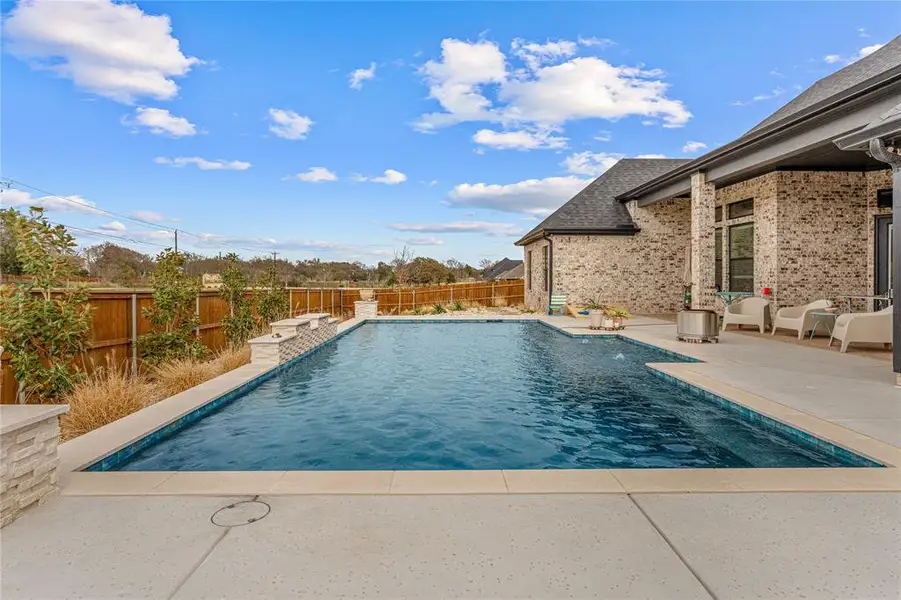 Exterior details and patio area of a home in , Woodway (Image 4).