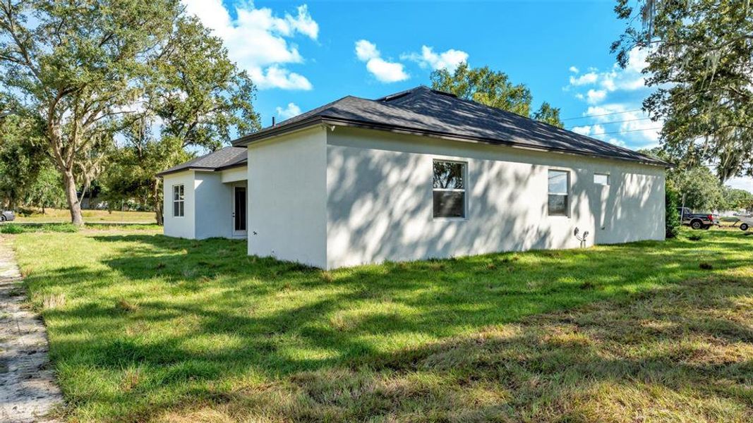 Front exterior of a new home in , Lakeland, FL, highlighting curb appeal (Image 26).