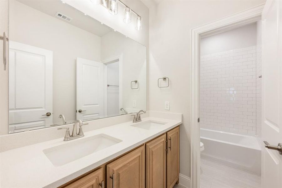 Furnished interior view inside a new home in Hayes Crossing, Midlothian (Image 9). Furnished interior view inside a new home in Hayes Crossing, Midlothian (Image 9).