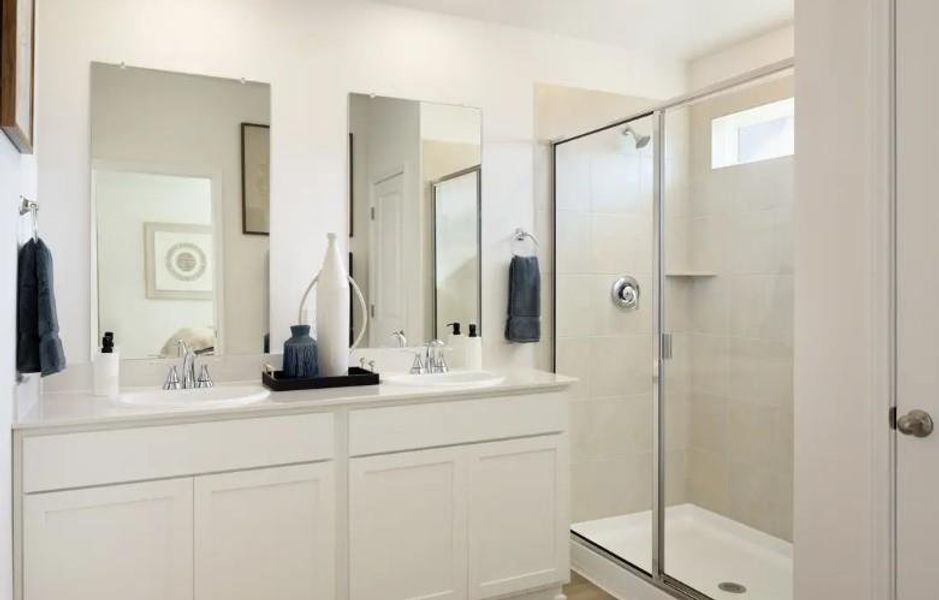 Photos are not of the actual home, but are photos of the builder home with same floorplan with similar interior finishes.