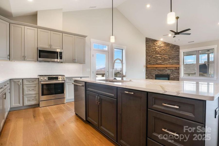 Kitchen with Island overlooking Living Room