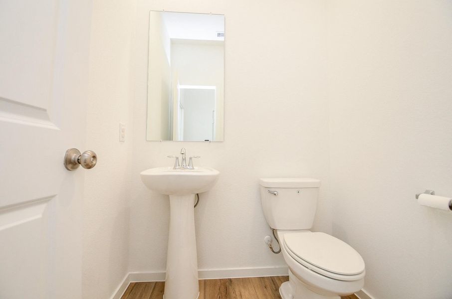 Half bath located near the private home office