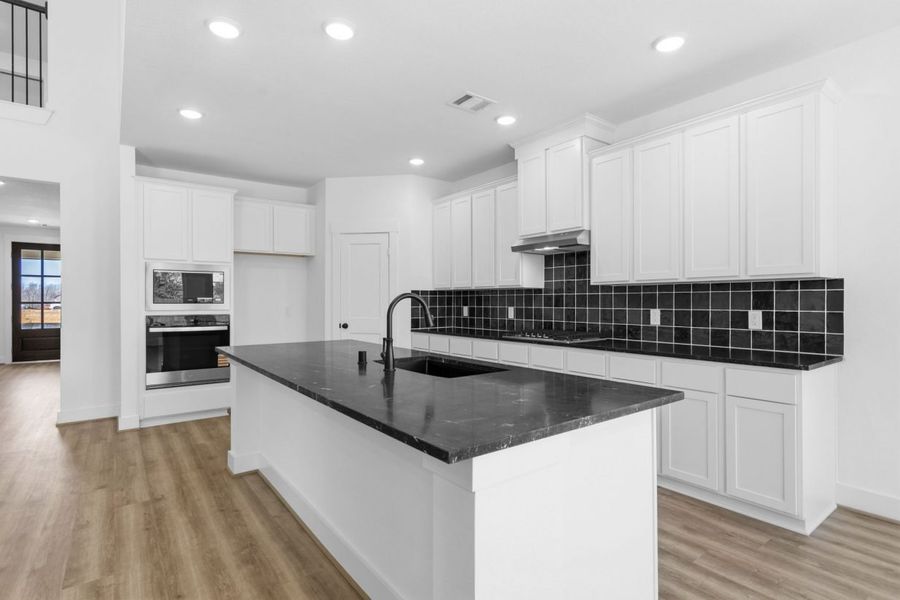 Furnished interior view inside a new home in Hunters Crossing, Sealy (Image 5).
