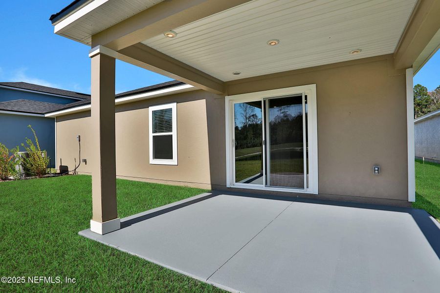 Exterior details and patio area of a home in Wilford Oaks, Orange Park (Image 28).