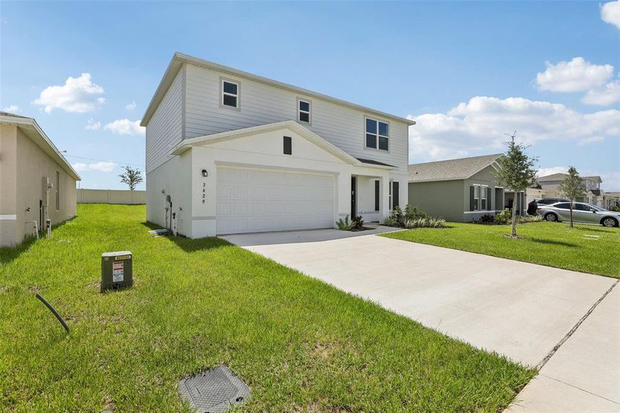 Exterior details and patio area of a home in The Grove at Scenic Terrace, Lake Hamilton (Image 25).