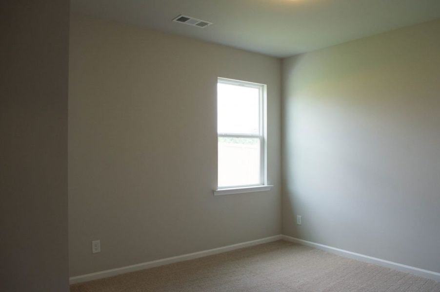 Representative unfurnished interior of a home built from the Richmond by Piedmont Residential in The Reserve at Willow Oaks, Canton (Image 9).