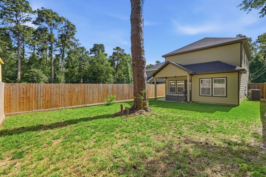 Exterior details and patio area of a home in , Conroe (Image 25). Exterior details and patio area of a home in , Conroe (Image 25).