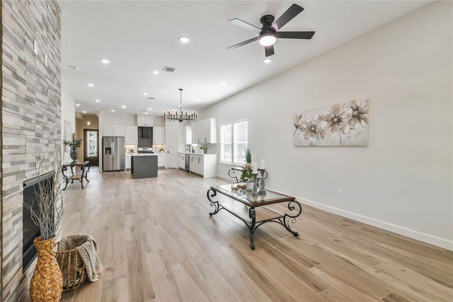 Large living area with ceiling fan.