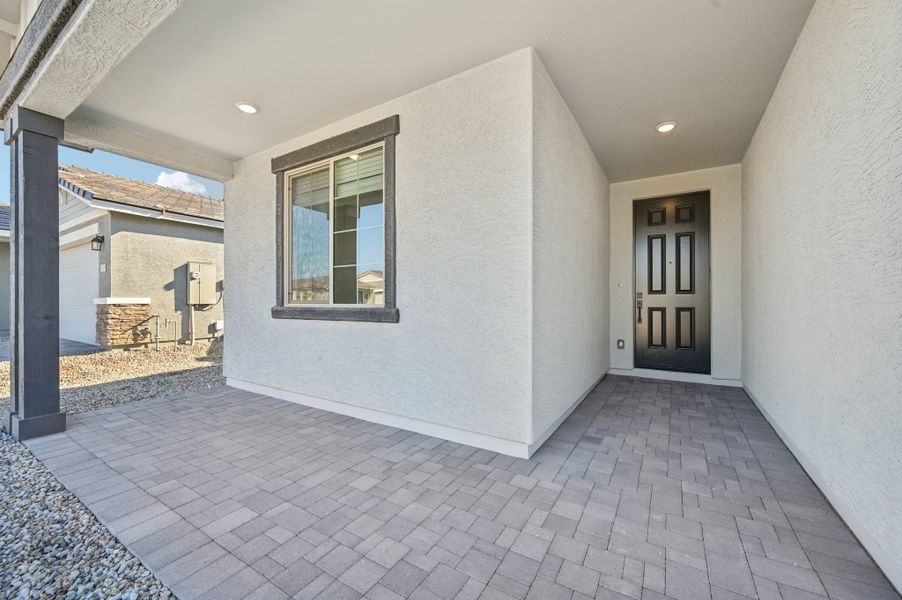 Covered front porch and entry. Finishes and options may vary by community.