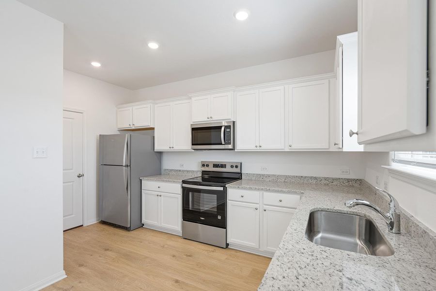 Furnished interior view inside a new home in Canyon Ranch, Jarrell (Image 4).