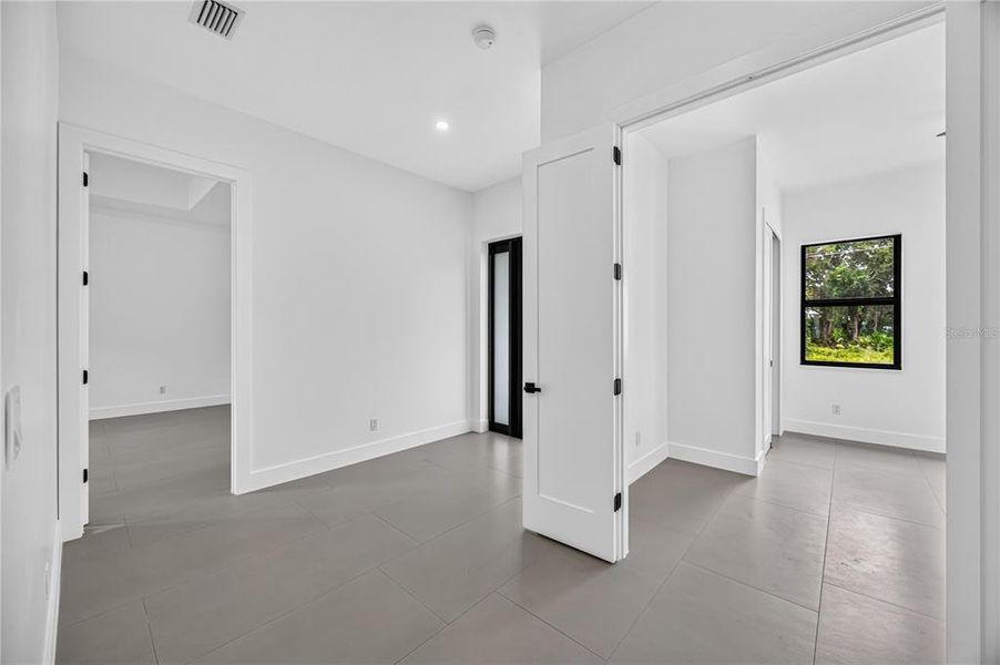 Spacious, unfurnished interior of a new home in , Port Charlotte (Image 31).