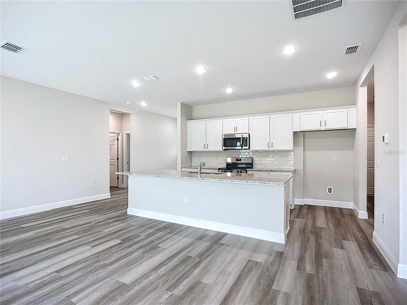 Furnished interior view inside a new home in , North Port (Image 33).