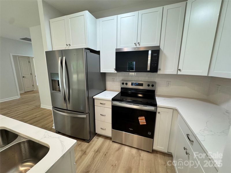 Furnished interior view inside a new home in , Lowell (Image 4).