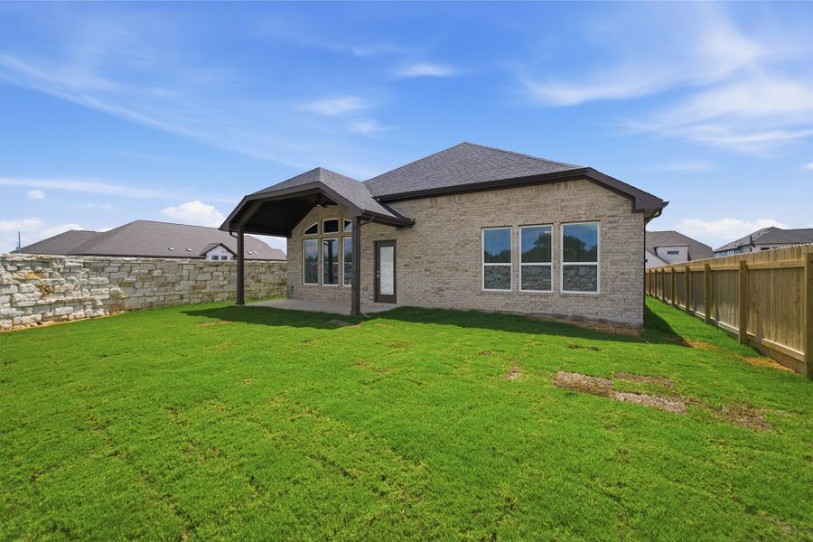 Exterior details and patio area of a home in Santa Rita Ranch, Liberty Hill (Image 28).