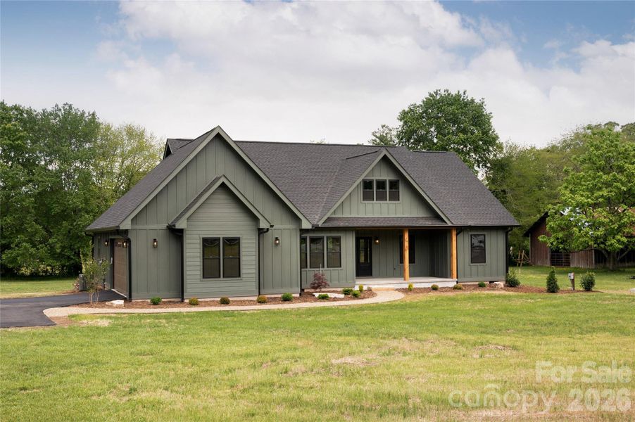 Front exterior of a new home in , Mills River, NC, highlighting curb appeal (Image 23).
