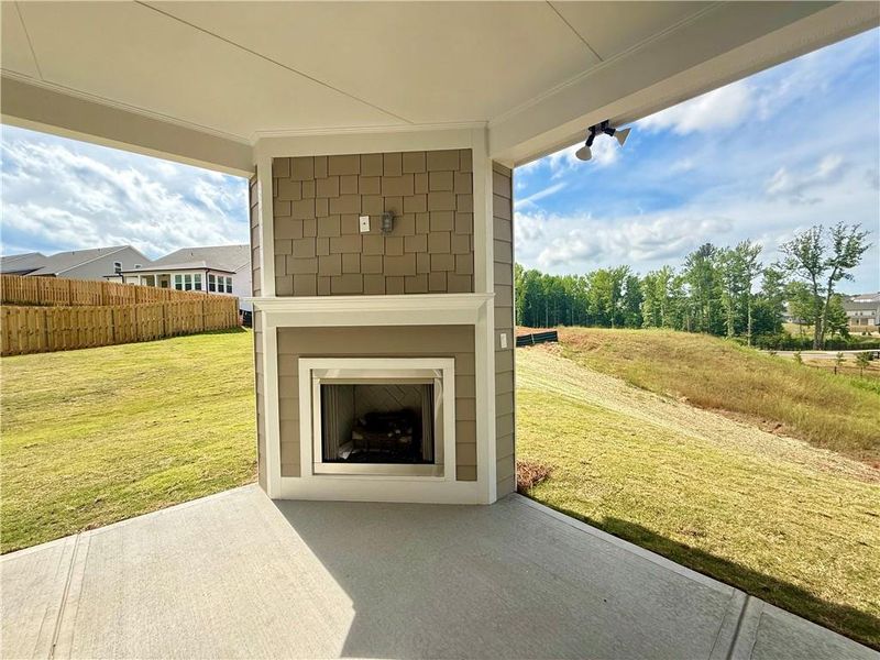 Exterior details and patio area of a home in Ponderosa Farms Reserve, Gainesville (Image 30).
