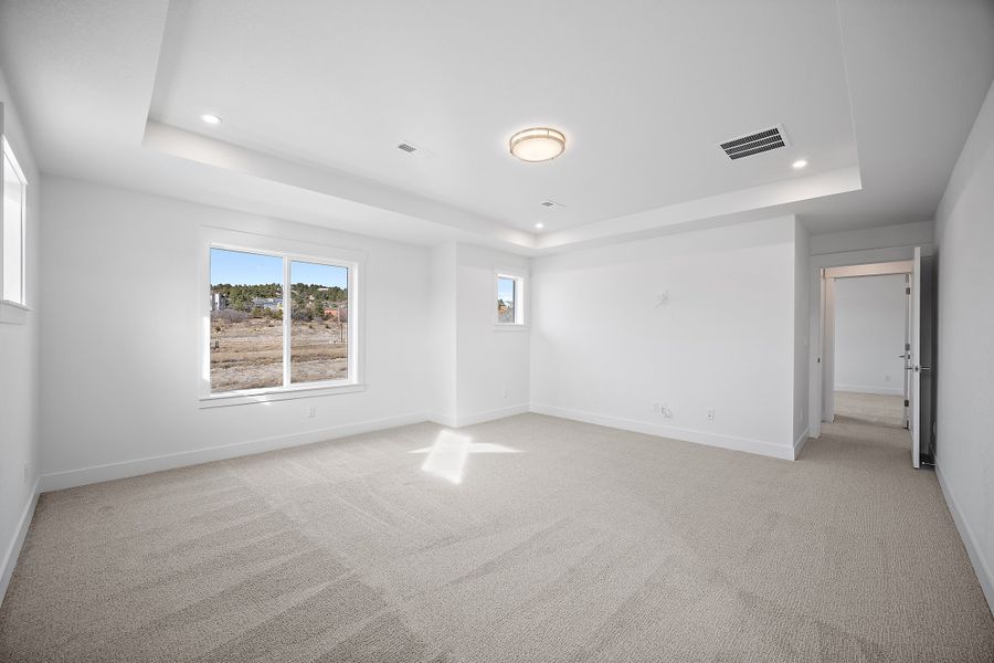 Representative unfurnished interior of a home built from the Qwynn by Lokal Homes in Jackson Creek, Monument (Image 13).