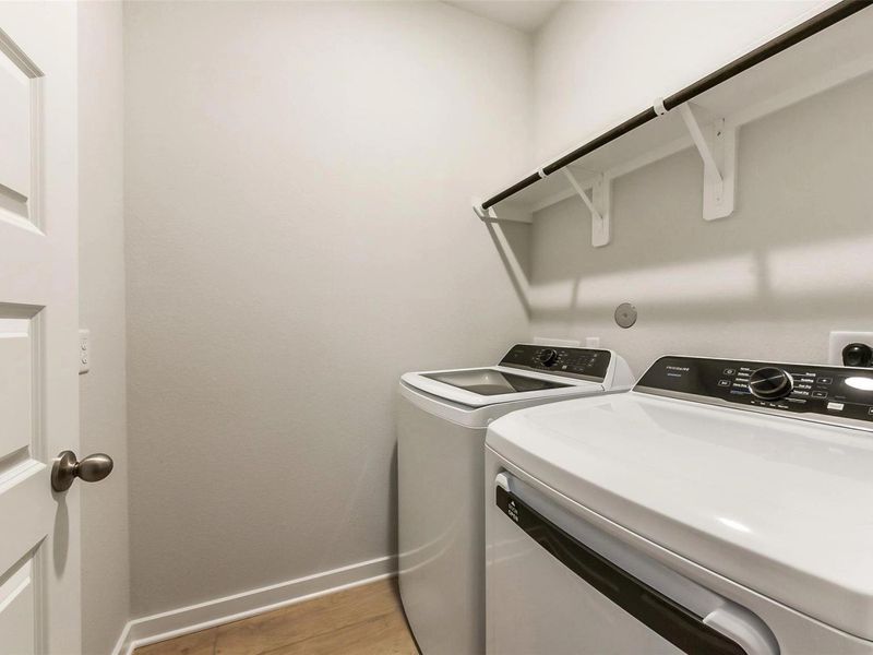 Close-up of interior finishes inside a home in Sunterra, Katy (Image 16).