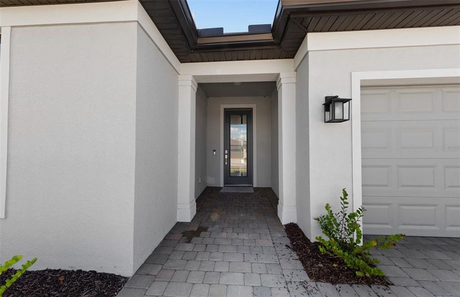 Exterior details and patio area of a home in Arbor Oaks, North Port (Image 16).