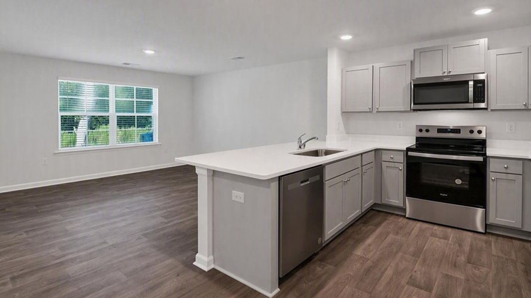 Furnished interior view inside a new home in Hunter's Branch Townhomes, Hopkins (Image 6). Furnished interior view inside a new home in Hunter's Branch Townhomes, Hopkins (Image 6).
