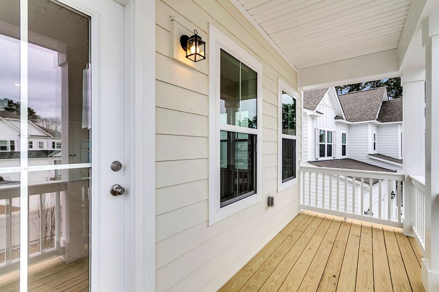 Exterior details and patio area of a home in Tidewater at Lakes of Cane Bay, Summerville (Image 3).