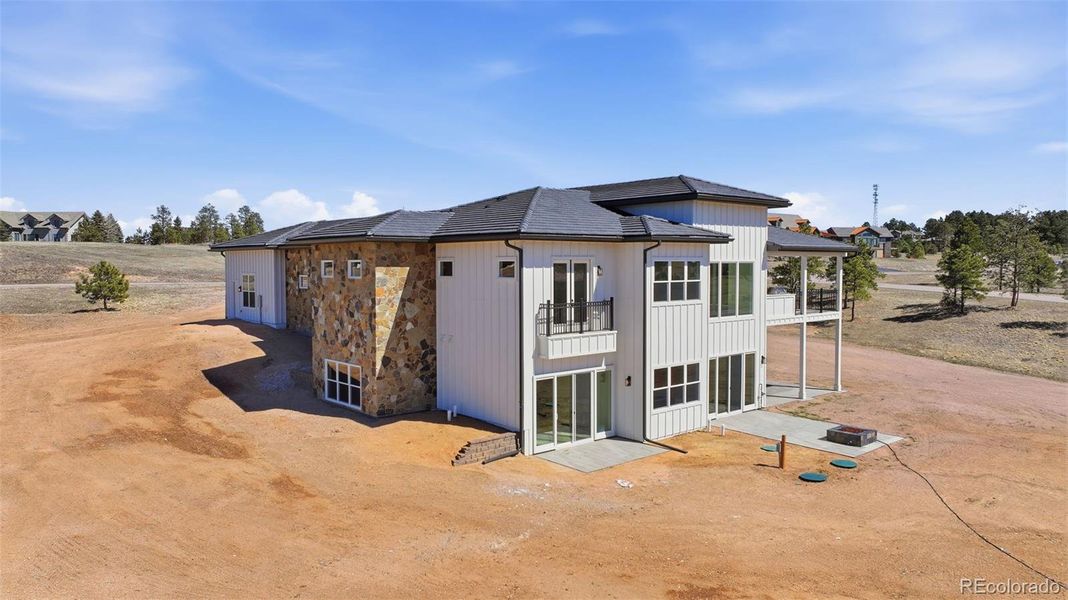 Rear of home looking southeast Rear of home looking southeast