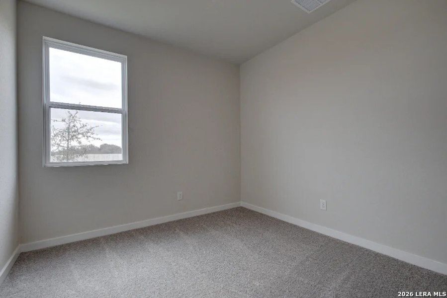 Spacious, unfurnished interior of a new home in Hacienda, San Antonio (Image 11).