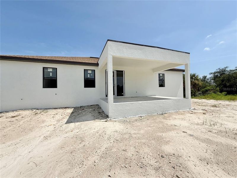 Exterior details and patio area of a home in , Port Charlotte (Image 14).