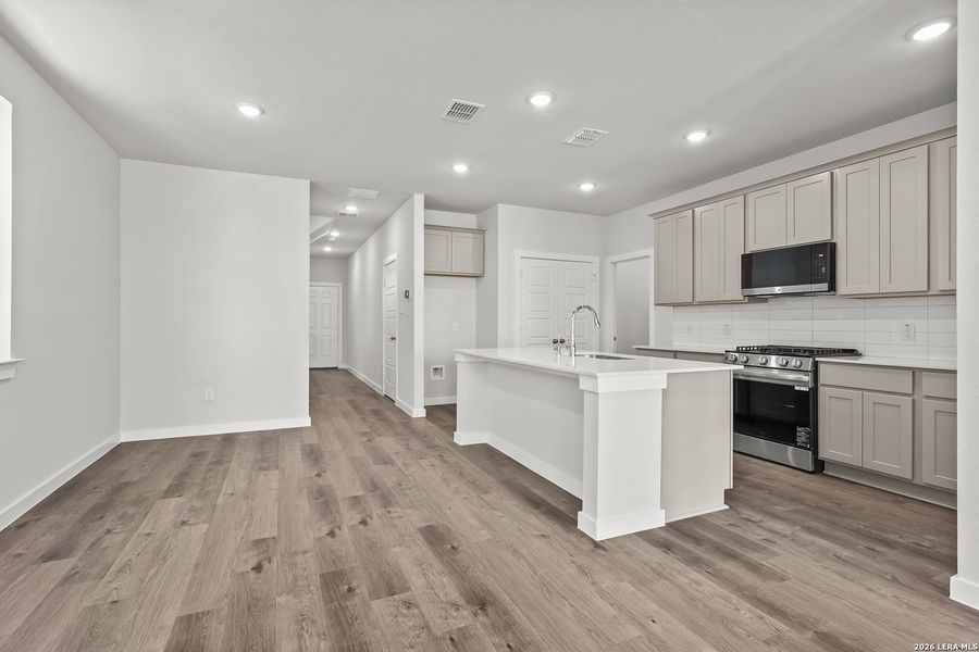 Furnished interior view inside a new home in Senna, Leon Valley (Image 9).