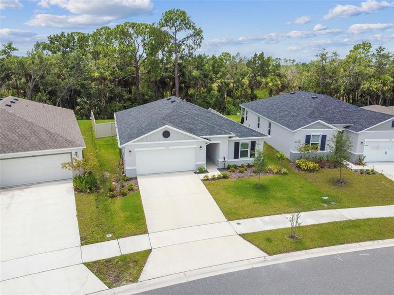 Front exterior of a new home in , Titusville, FL, highlighting curb appeal (Image 1).