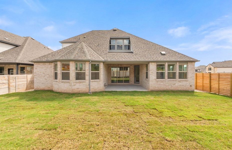 Exterior details and patio area of a home in Bluffview Reserve, Leander (Image 37).